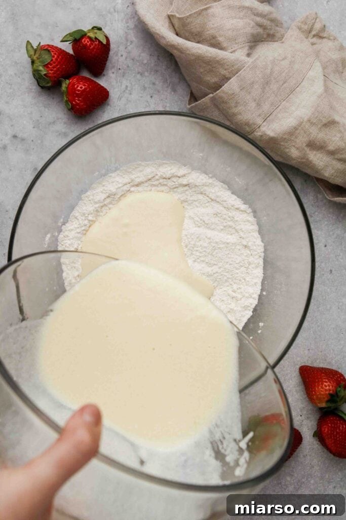 Wet and dry ingredients combined in a bowl, showing the thick batter