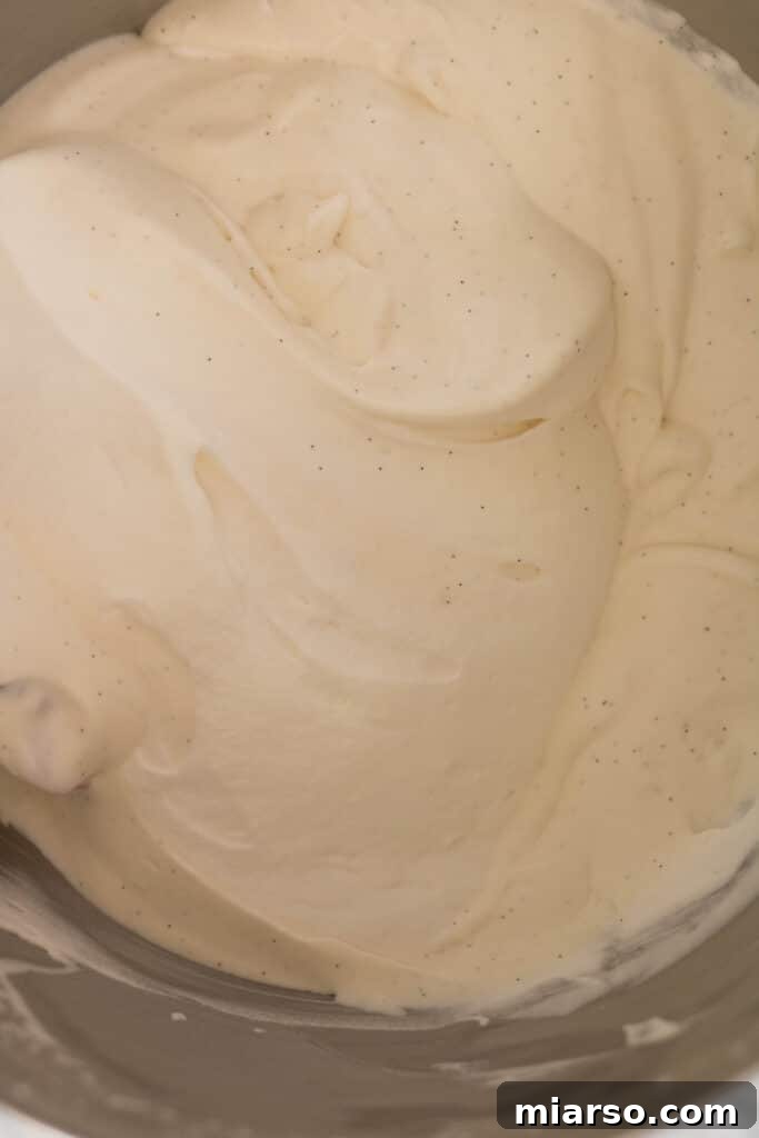 Perfectly whipped heavy cream with soft peaks, ready for the next step