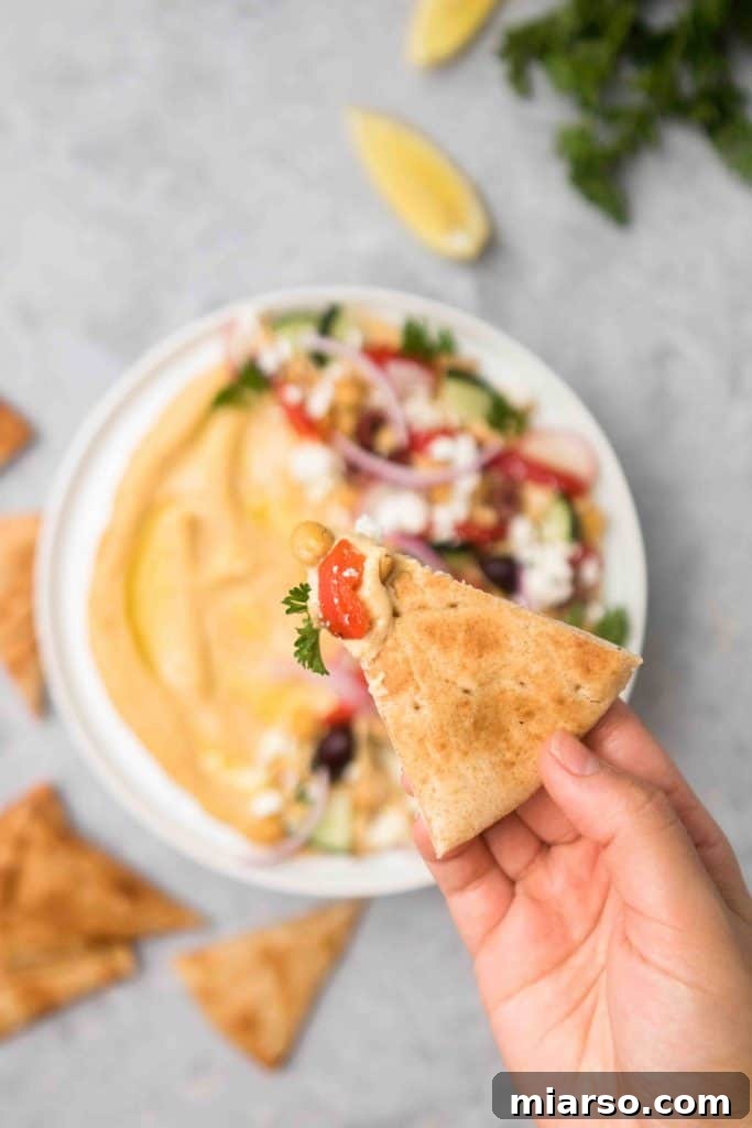 Effortless Mediterranean Hummus Platter 4 The best Mediterranean loaded hummus with a generous drizzle of olive oil