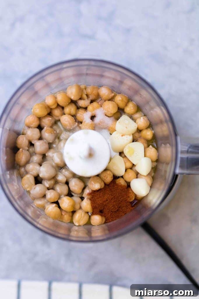 Effortless Mediterranean Hummus Platter 6 Blending chickpeas for smooth hummus base