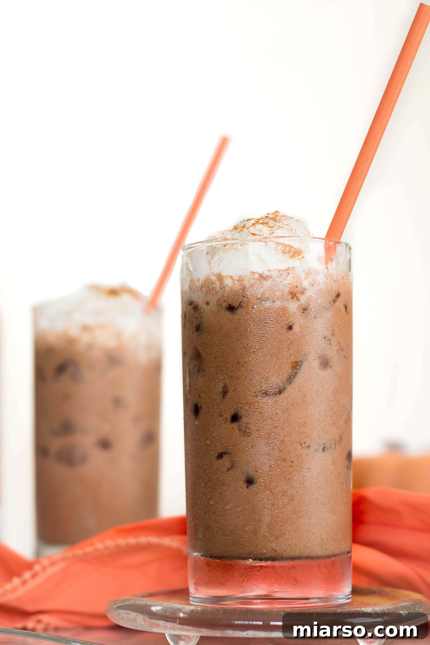 The Ultimate Vegan Iced Pumpkin Spice Hot Chocolate 2 Refreshing Iced Vegan Pumpkin Spice Hot Chocolate, perfect for warm fall days.