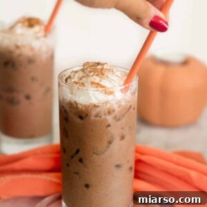 Iced Pumpkin Spice hot chocolate with whipped cream