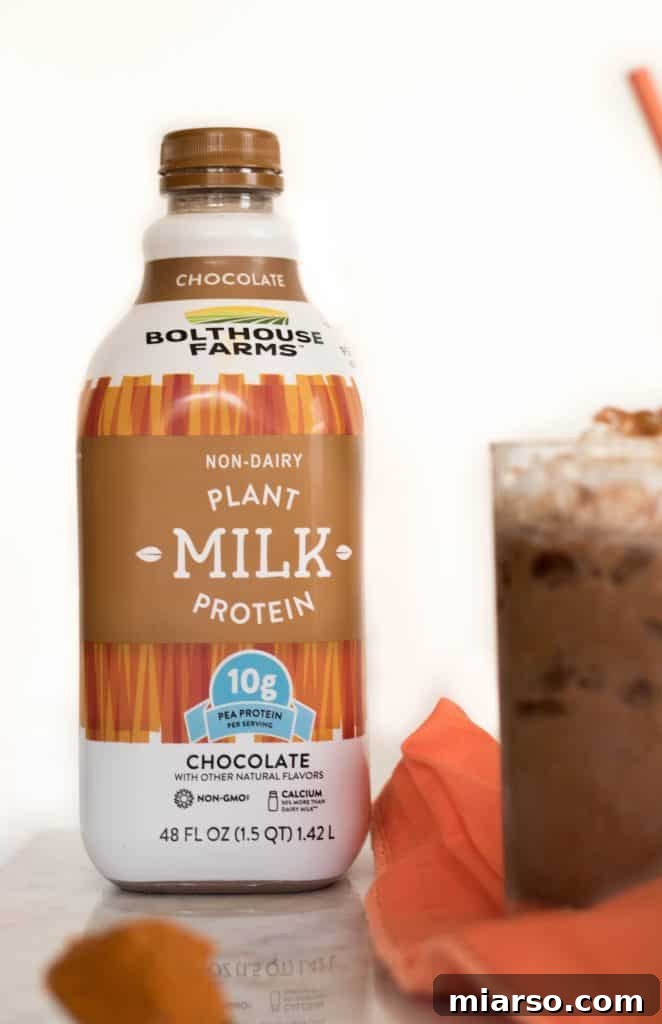 The Ultimate Vegan Iced Pumpkin Spice Hot Chocolate 6 Two glasses of Iced Vegan Pumpkin Spice Hot Chocolate ready to be enjoyed.
