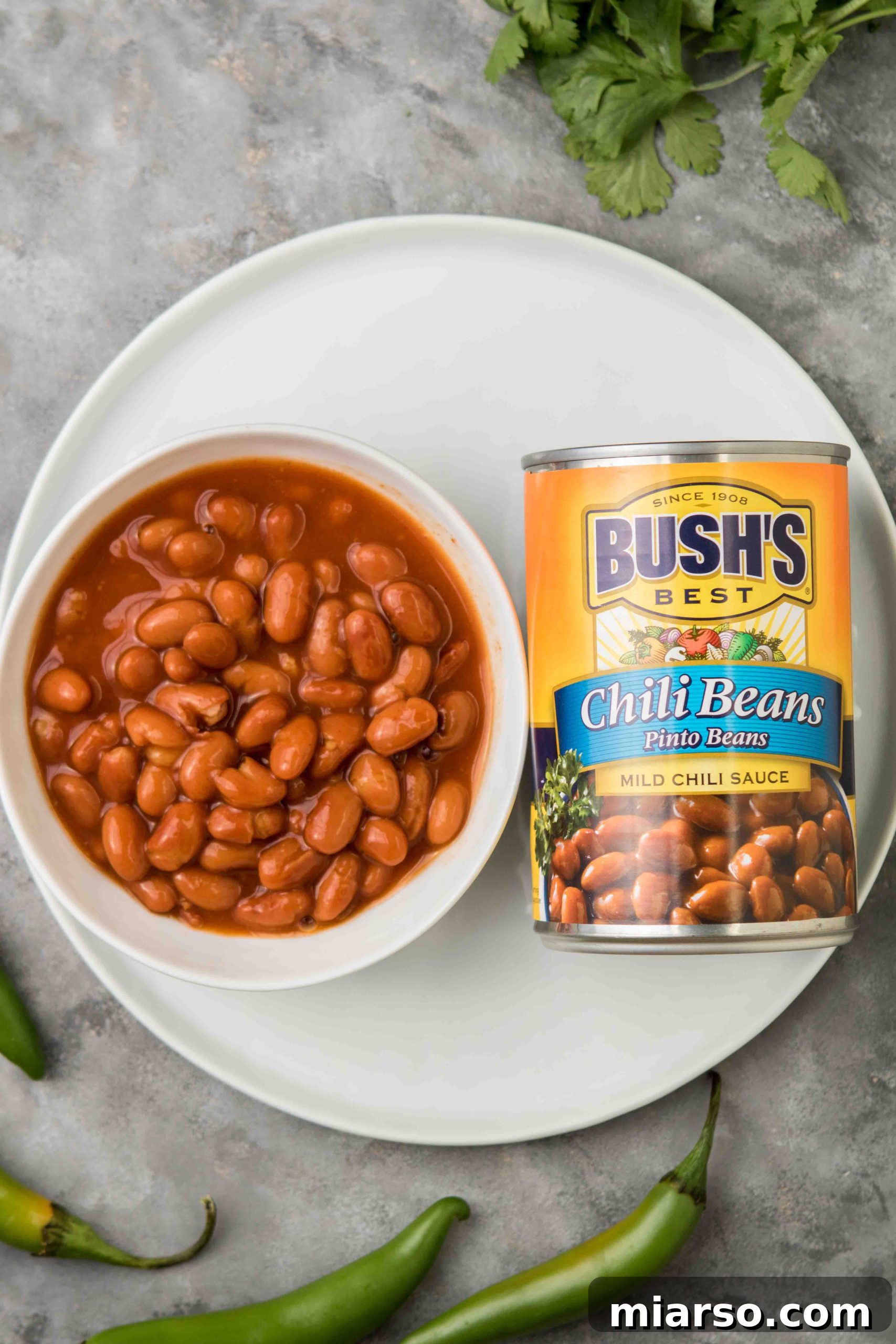 Mediterranean chili recipe with Bush's beans, served in a bowl with toppings