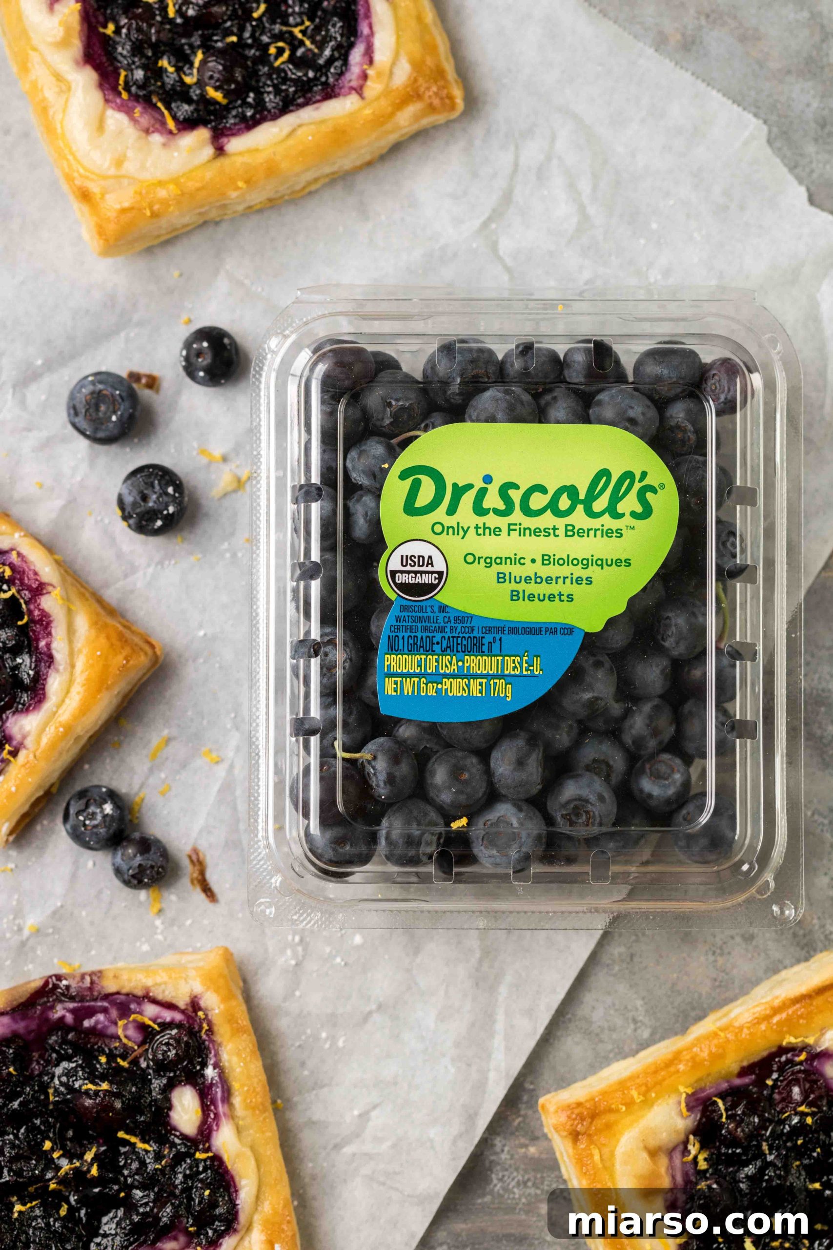 Flaky Blueberry Cheese Danish Made Easy 4 Fresh Driscoll's blueberries, cream cheese, and puff pastry, ready for making blueberry cheese danishes.