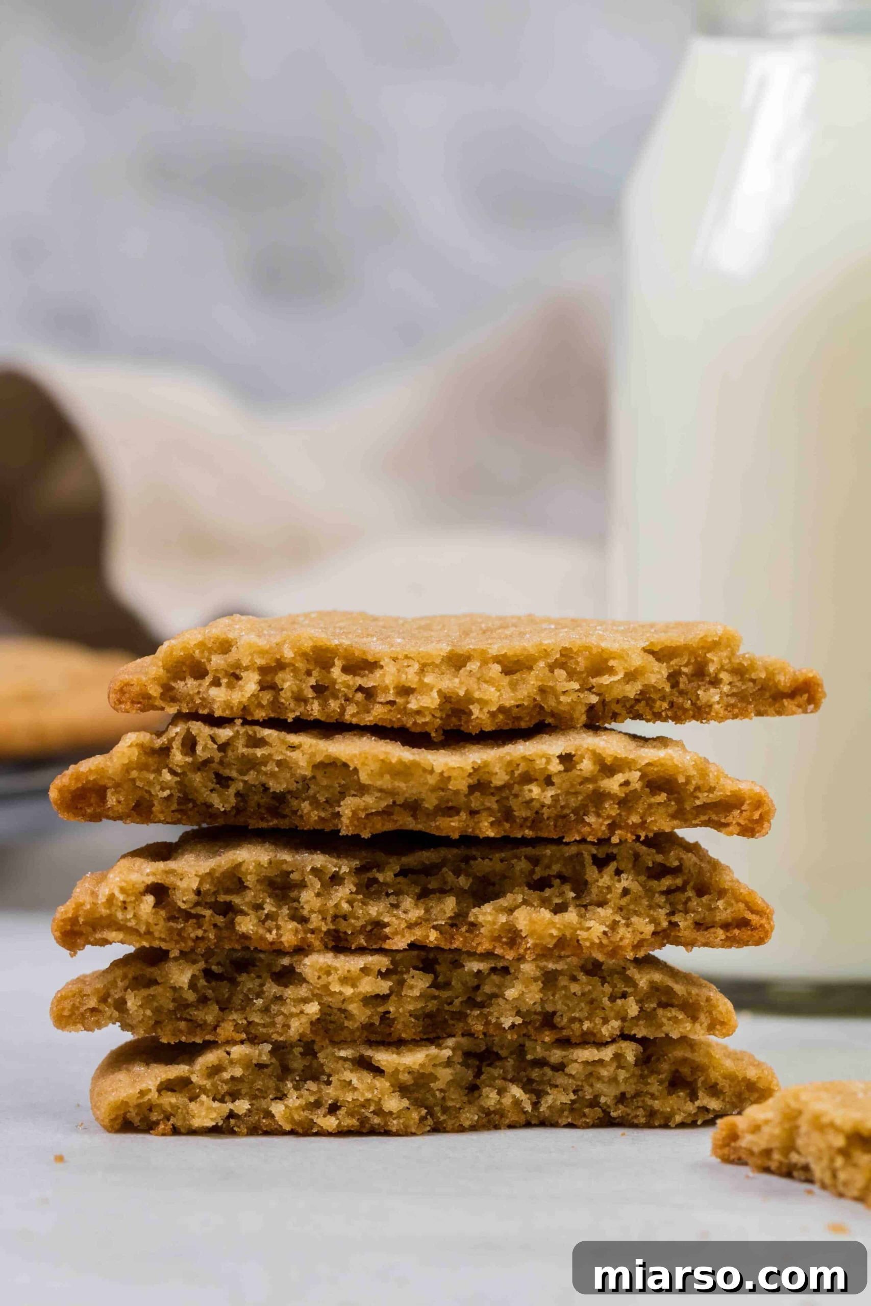 The inside of the chewy brown butter cookie, showcasing its soft texture and rich caramel color.
