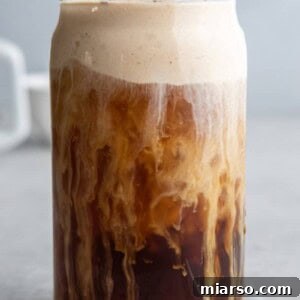 Fall's Ultimate Starbucks Pumpkin Cream Cold Brew 10 A glass of homemade Pumpkin Cream Cold Brew with a perfect foam topping.