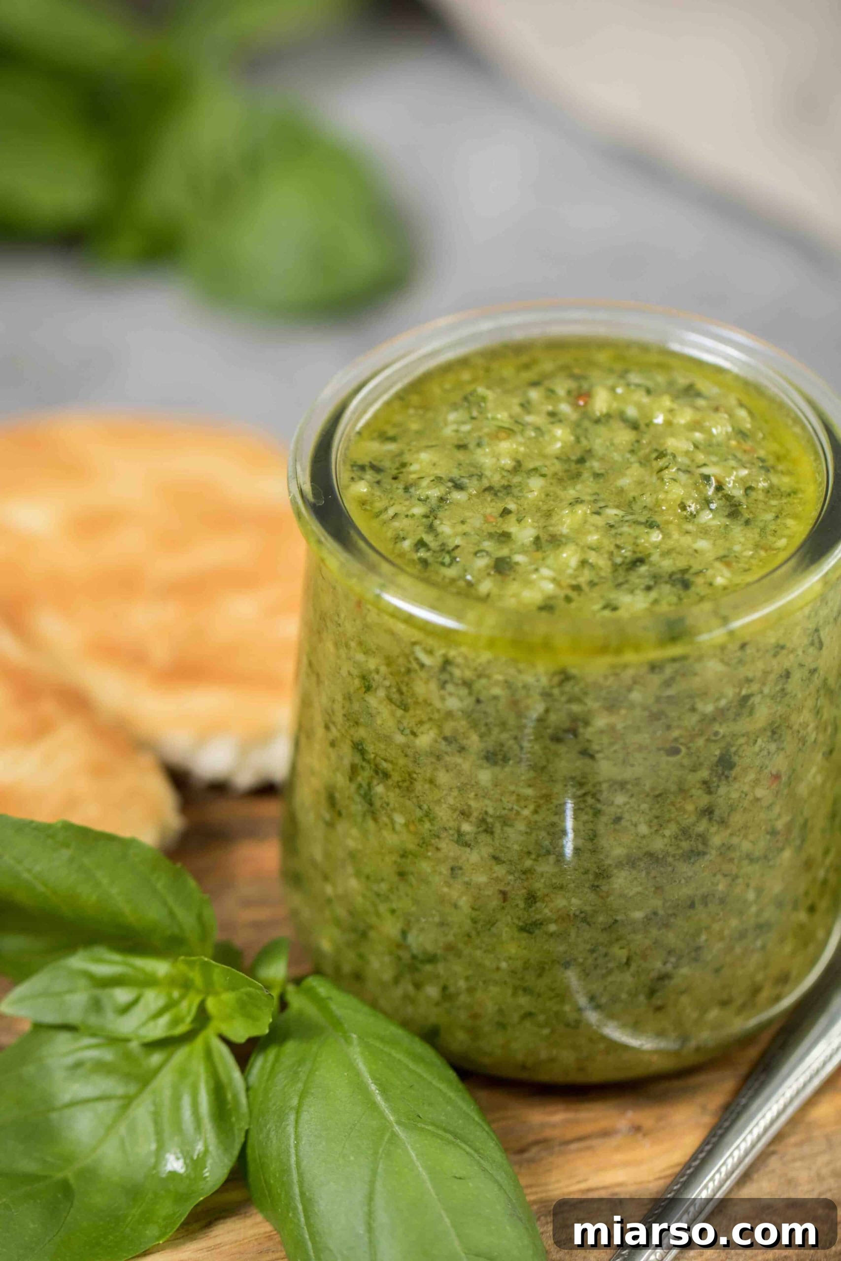 Effortless Homemade Pesto Perfection 2 Fresh homemade pesto sauce in a bowl, ready to be served or stored.