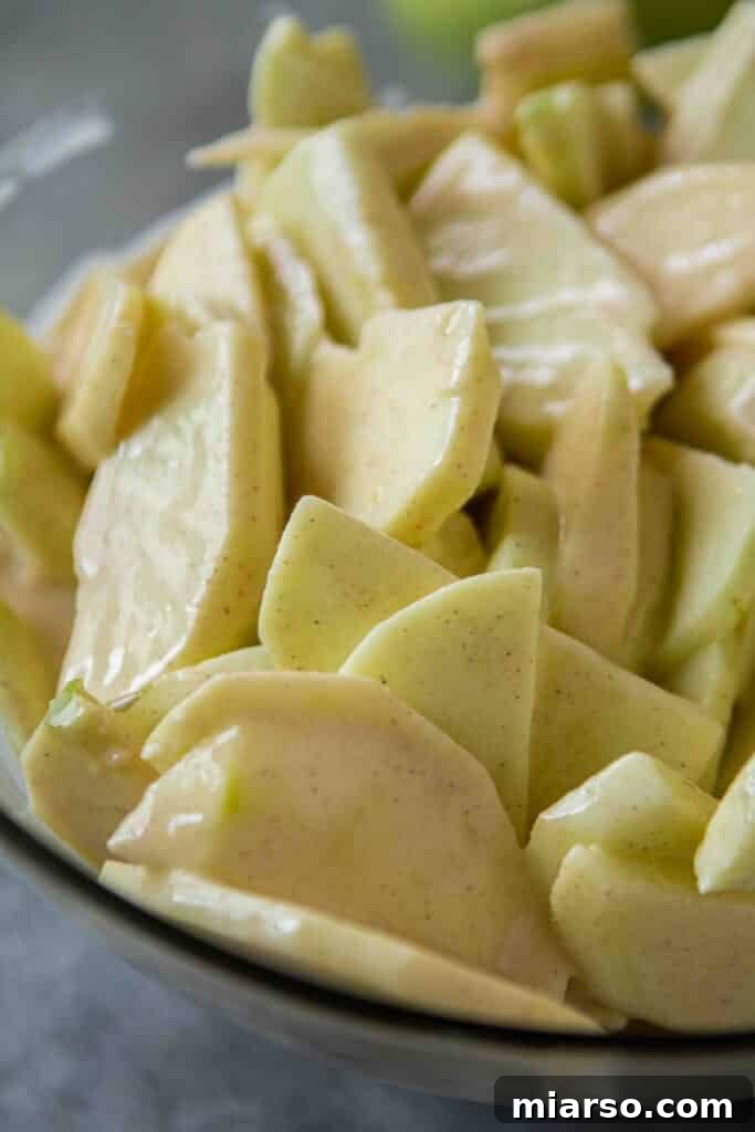 Thinly sliced apples coated in the creamy sour cream batter.