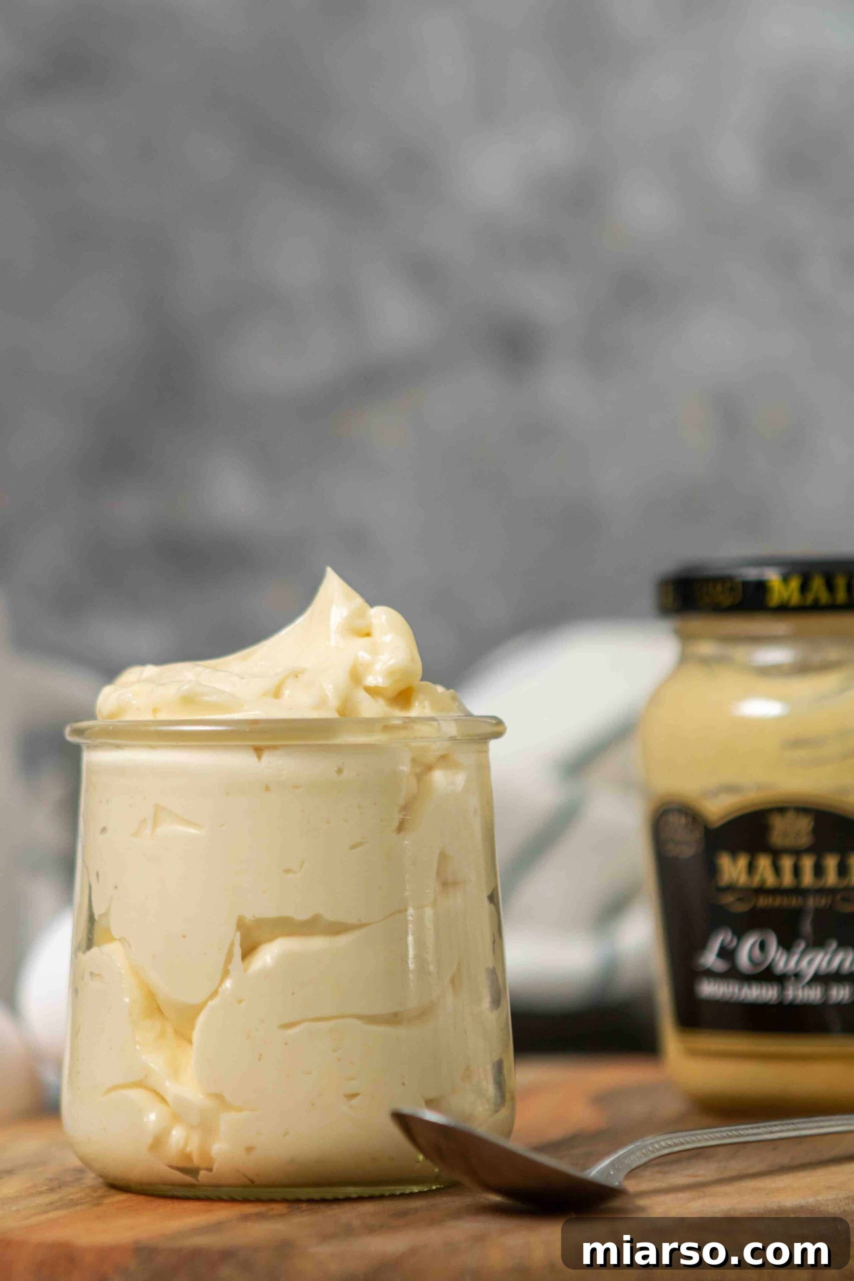 A jar of the easiest homemade mayo, looking smooth and creamy.