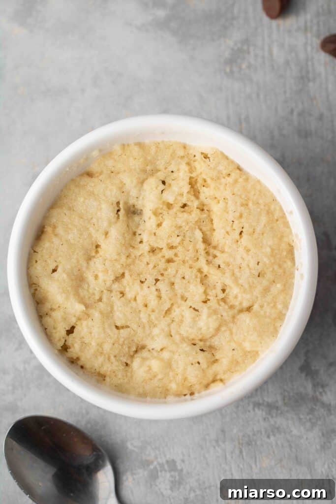 A close-up view of the cookie in a bowl, showing its soft texture.