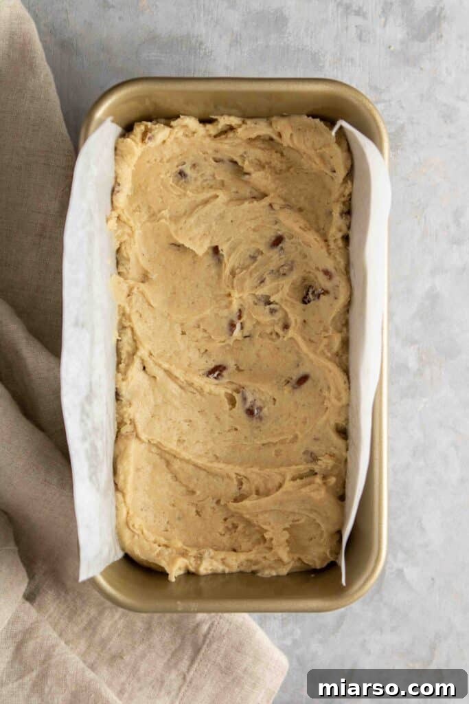 Step-by-step image showing mixed dry ingredients for maple pecan bread