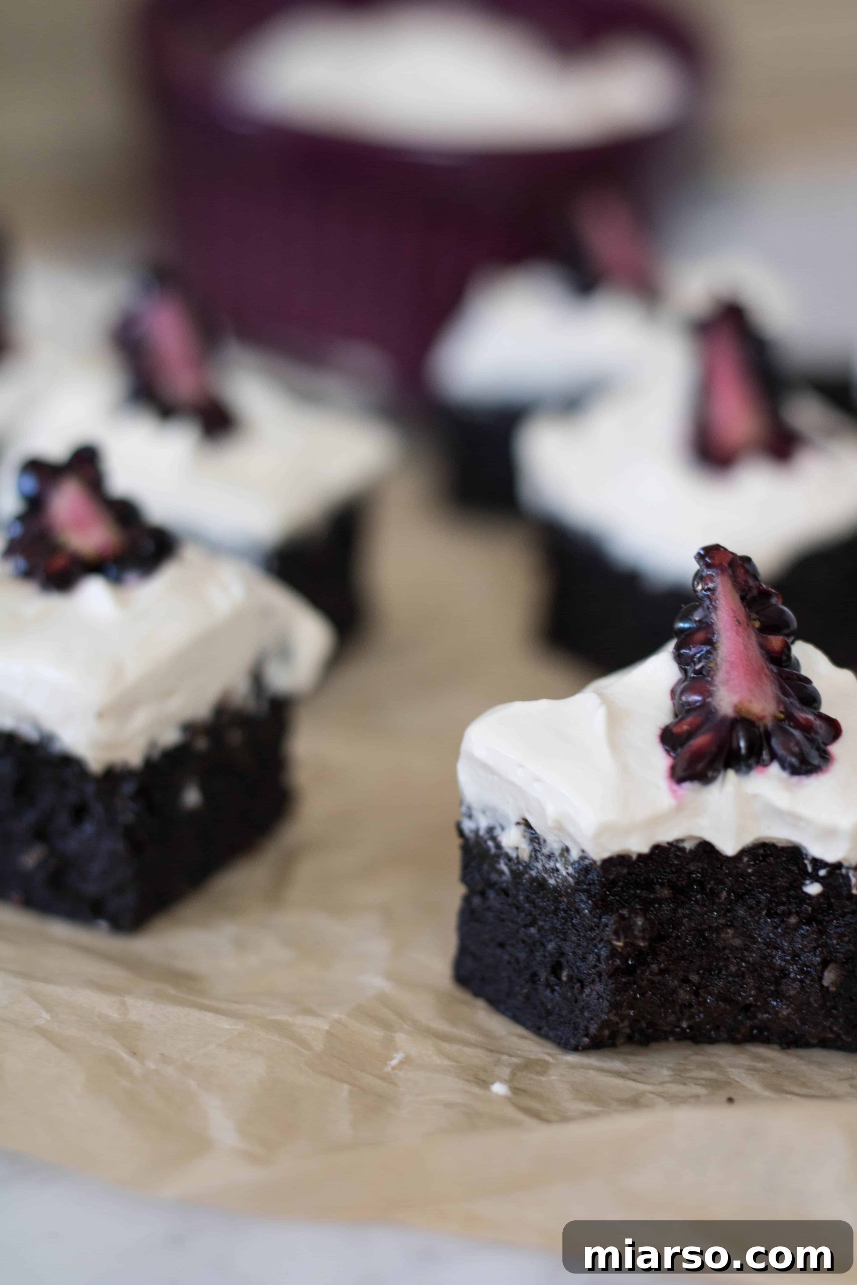 Plated sweet potato brownies with decorative berries