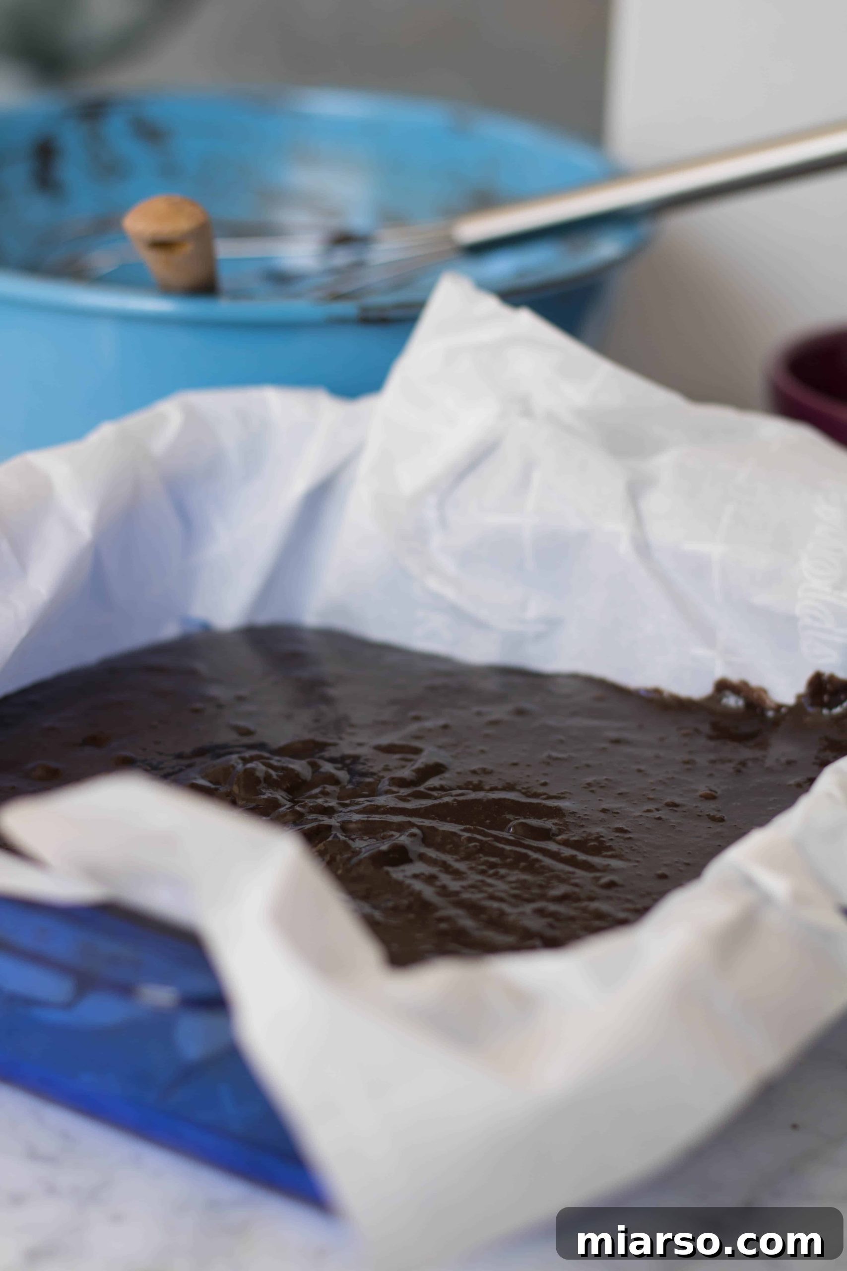 Sweet potato brownie batter in baking pan, ready for oven