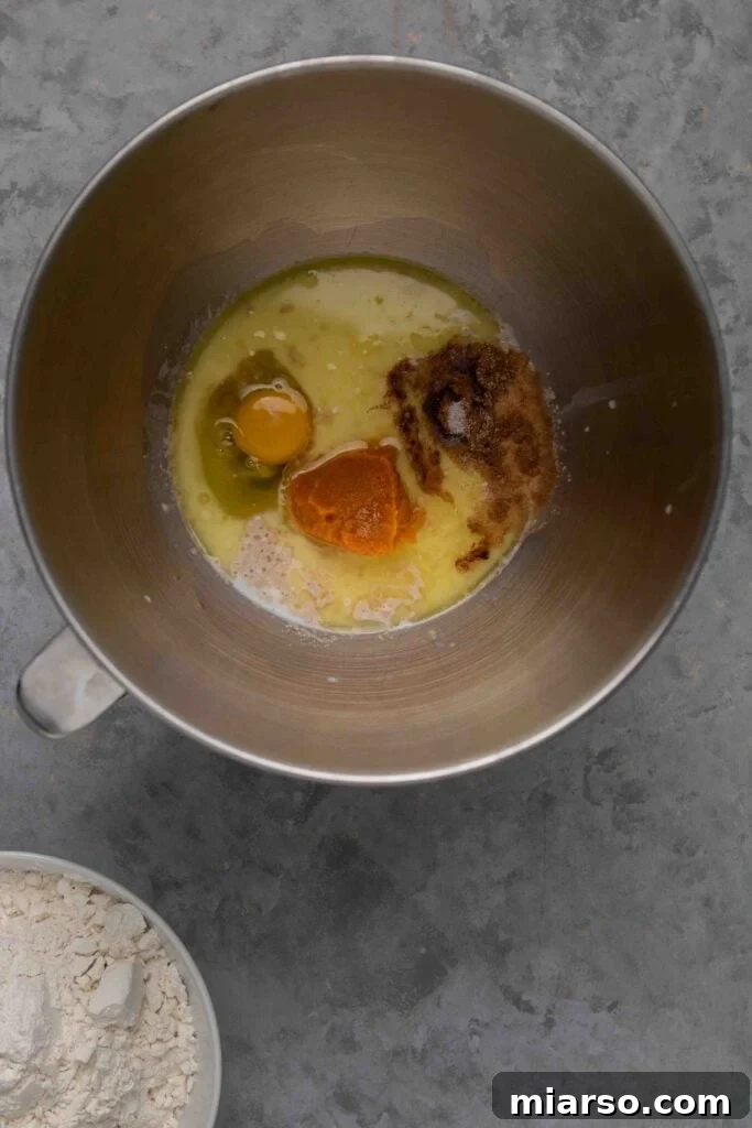 Adding wet ingredients to the yeast mixture