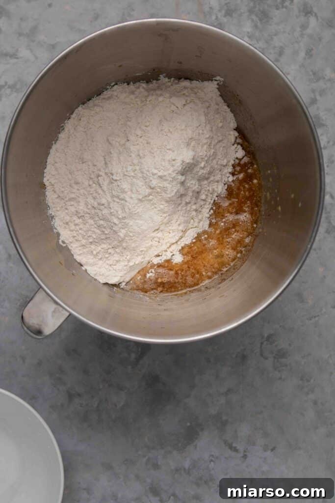 Adding flour to the wet mixture