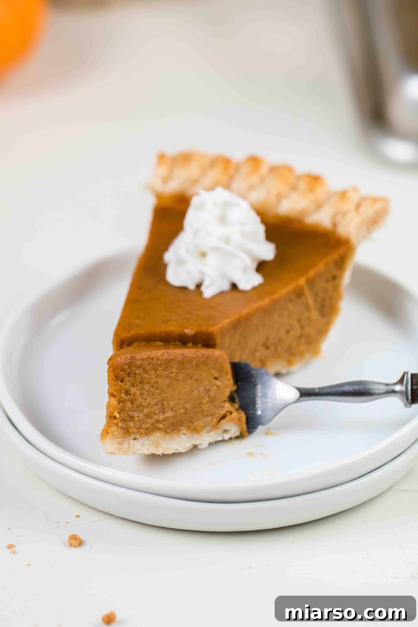 Easy Homemade Pumpkin Pie, freshly baked and sliced