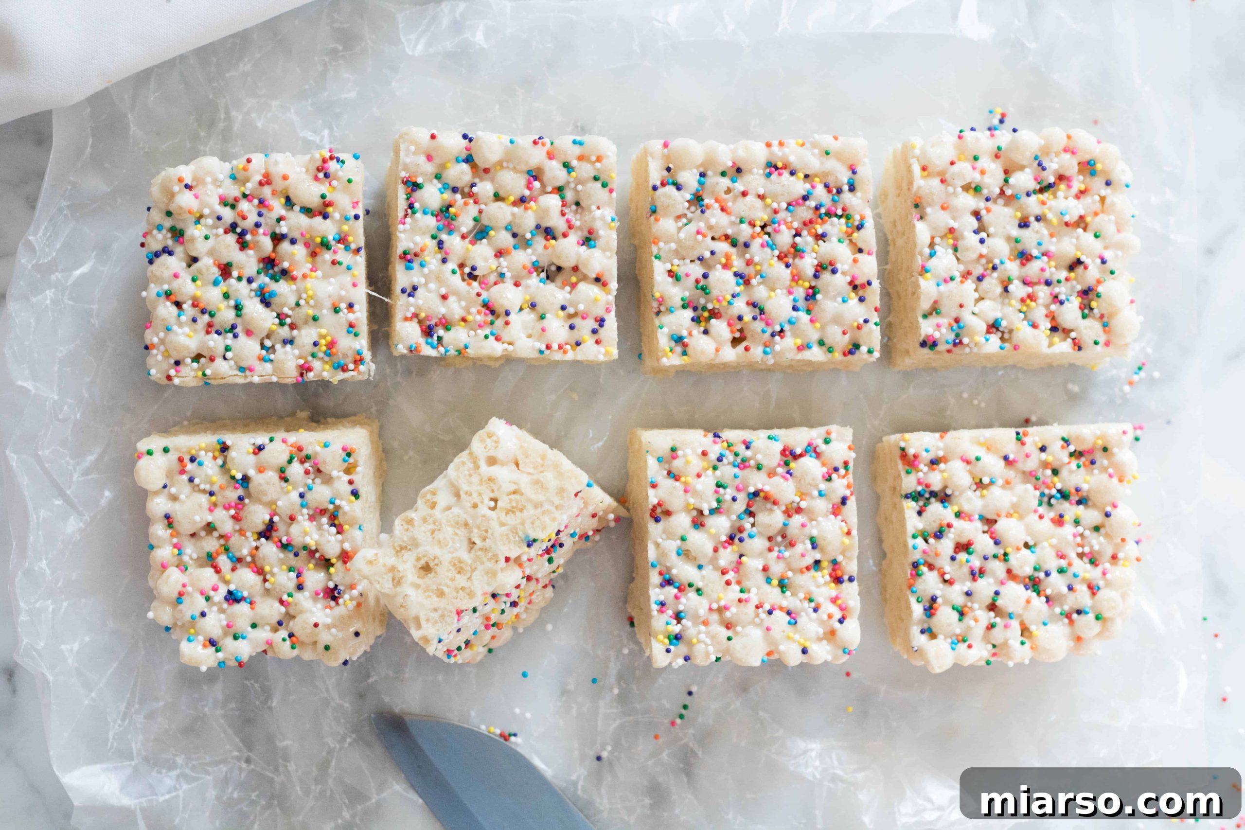 Easy Quinoa Pop Krispie Treats topped with colorful sprinkles