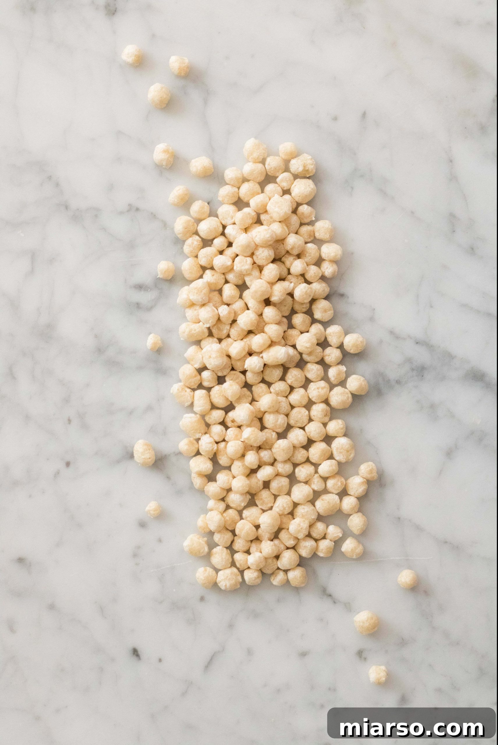 Bowl of popped quinoa ready for making treats