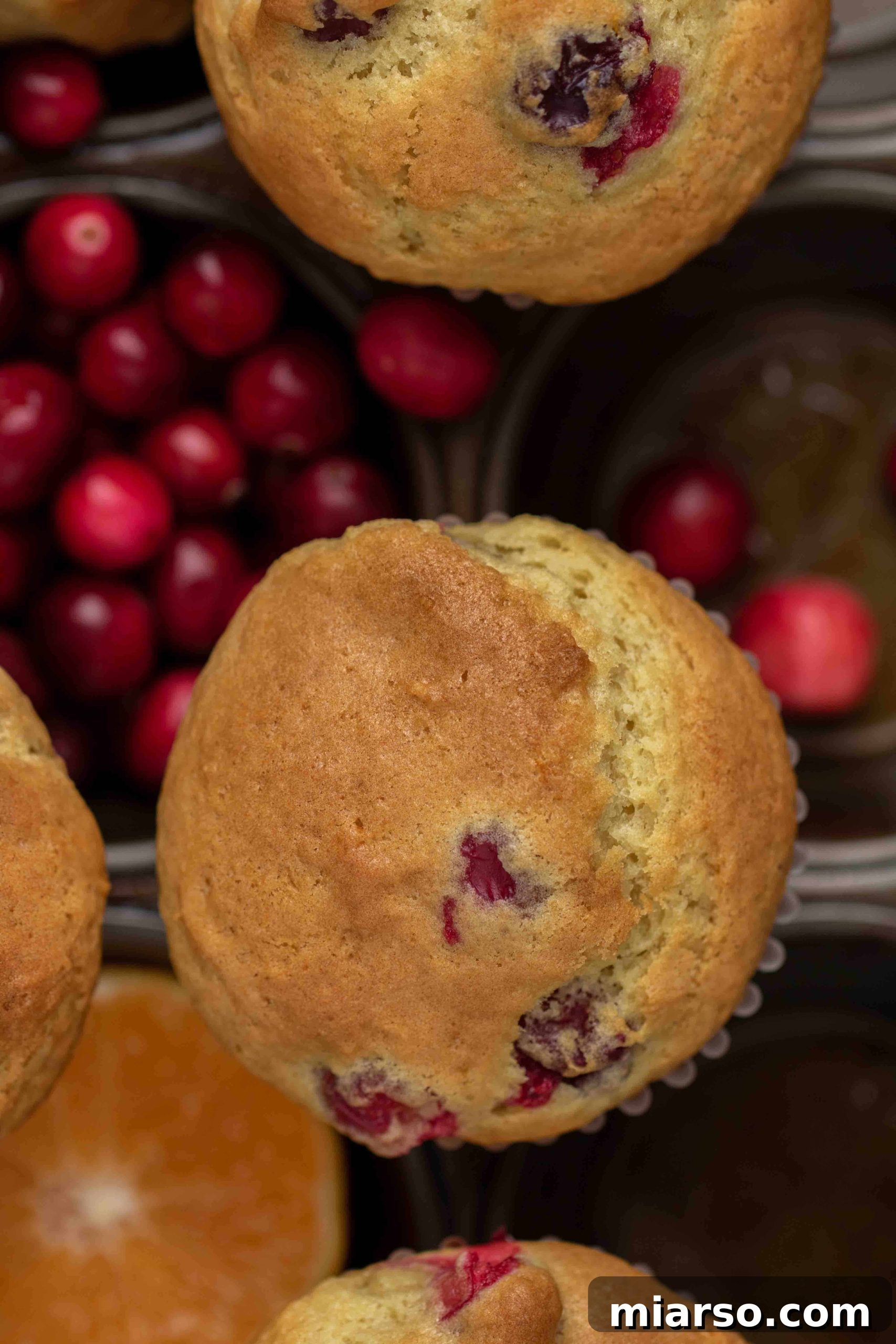 Cranberry orange muffins on a serving tray