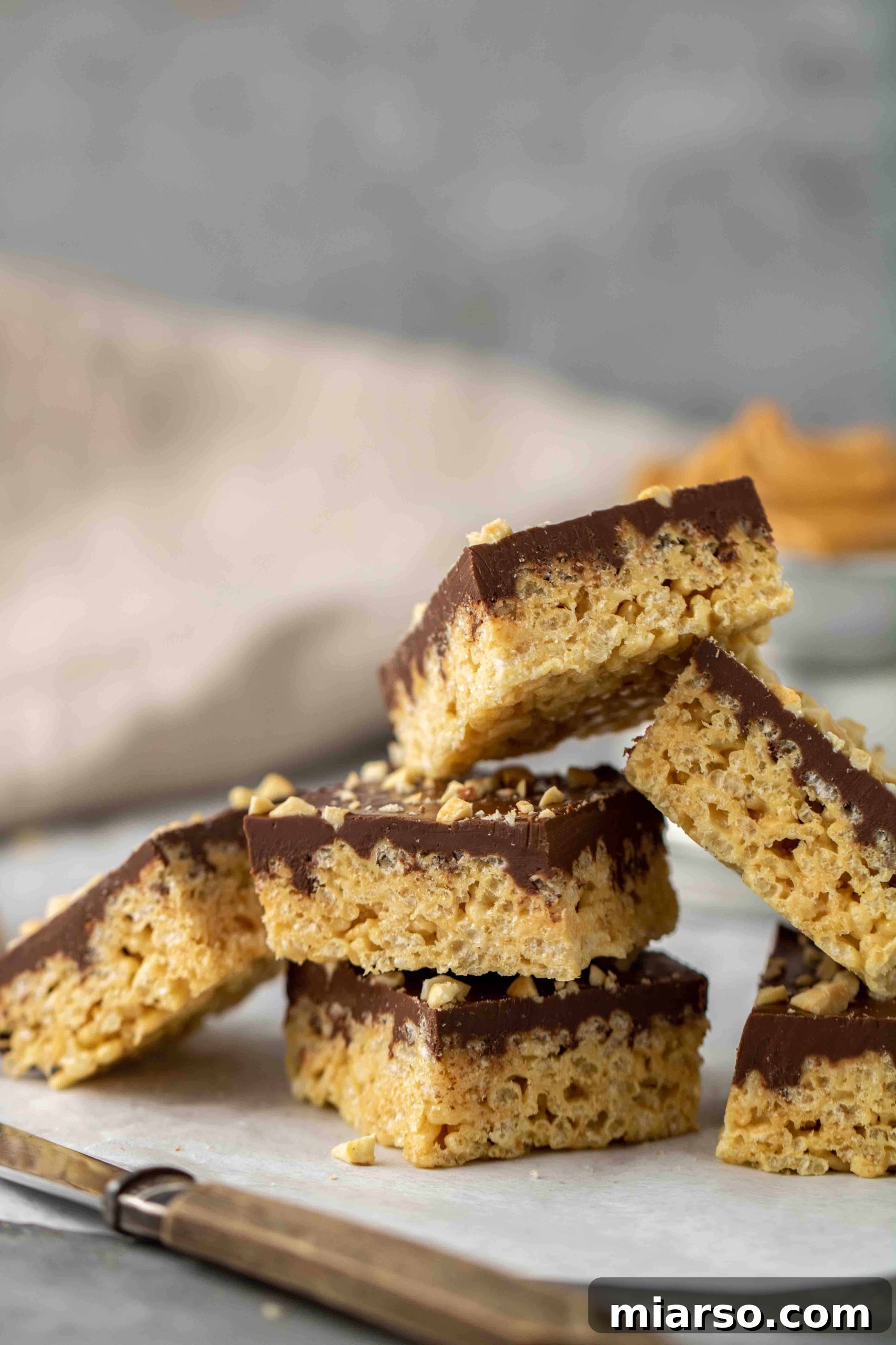 No-Bake Chocolate Peanut Butter Crispy Bars 3 Stack of rich chocolate peanut butter rice krispie treats