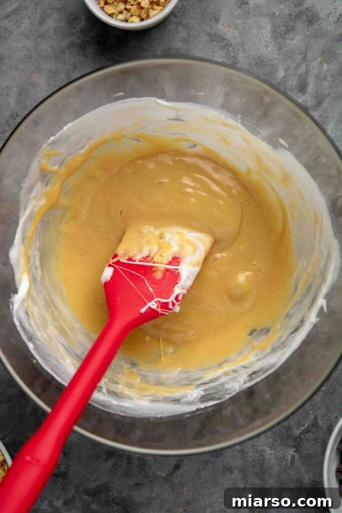 No-Bake Chocolate Peanut Butter Crispy Bars 7 Smooth mixture of melted marshmallow, butter, and peanut butter