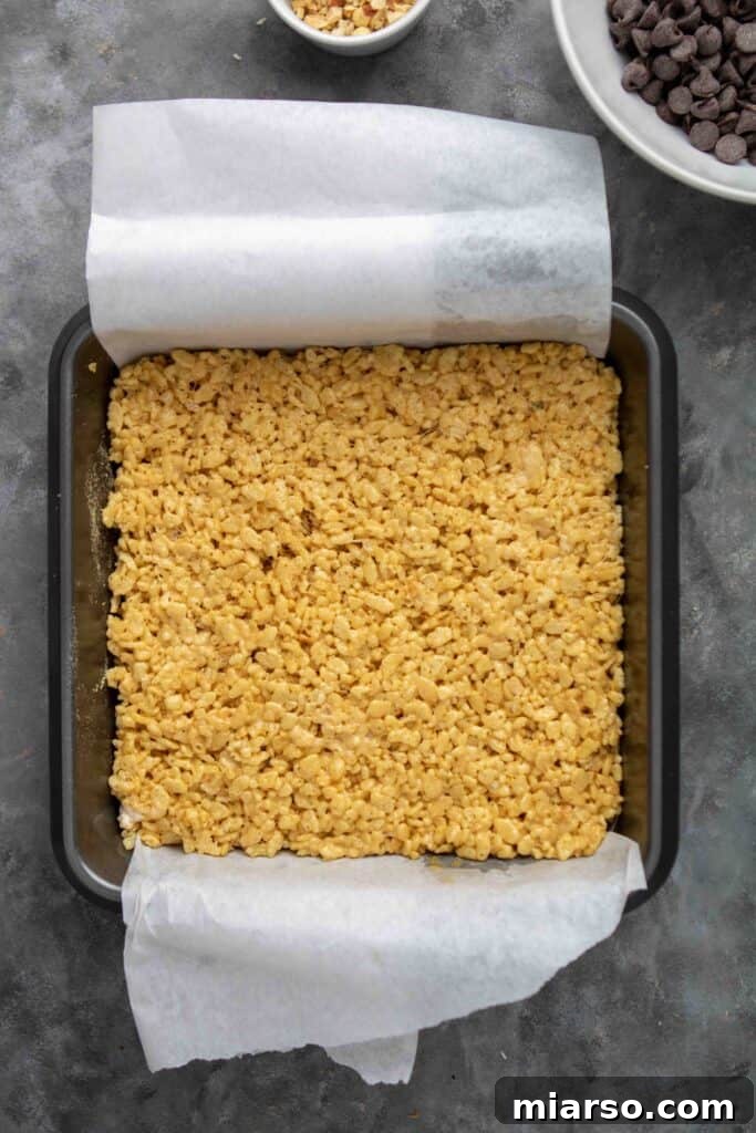 No-Bake Chocolate Peanut Butter Crispy Bars 10 Uncut rice krispie treats evenly spread in the pan