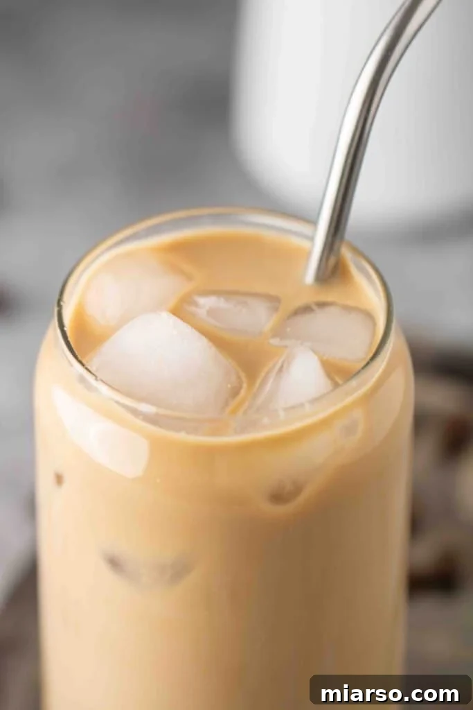 Starbucks Velvety Vanilla Cold Brew 3 Two glasses of homemade cold brew coffee topped with vanilla sweet cream and ice, ready to drink.