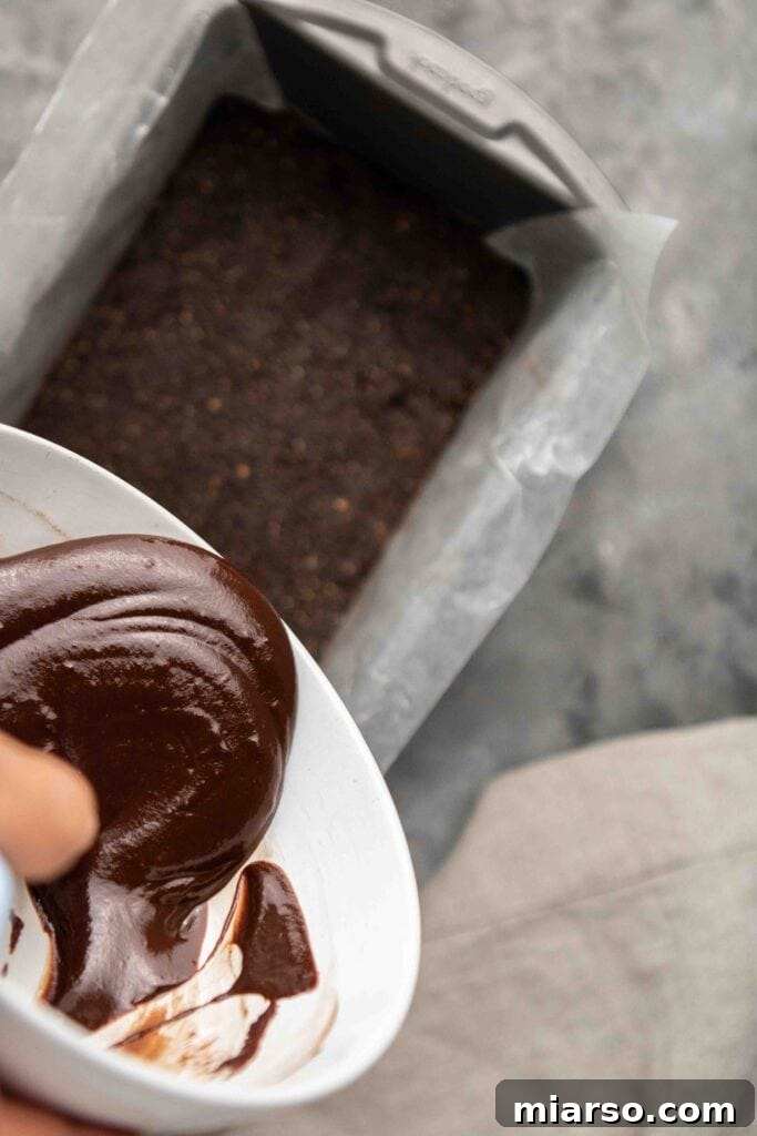 Step-by-step guide: Processing toasted hazelnuts into creamy hazelnut butter.