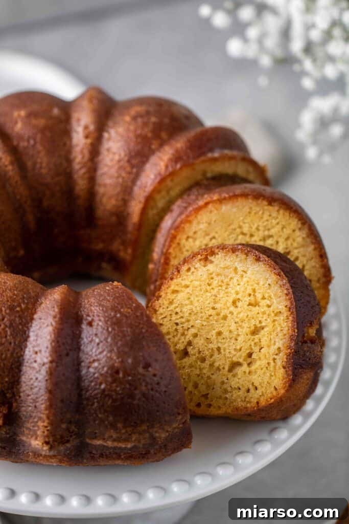 Moist butter cake crack cake recipe, glistening with syrup