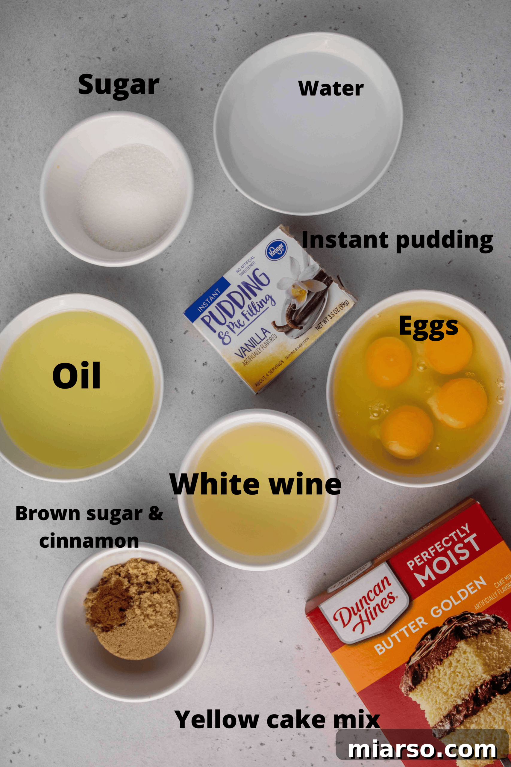 Ingredients for crack cake with yellow cake mix and vanilla pudding