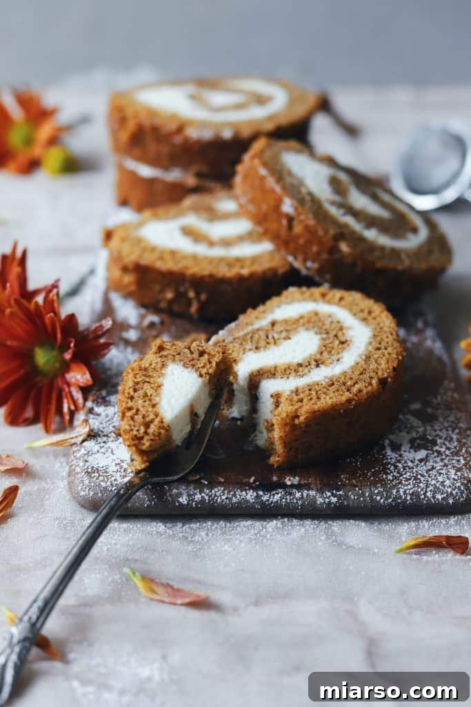 24 Days of Pumpkin Delights 6 pumpkin cream cheese swirl cake from the buttery whisk for the 24 days of pumpkin recipes collection