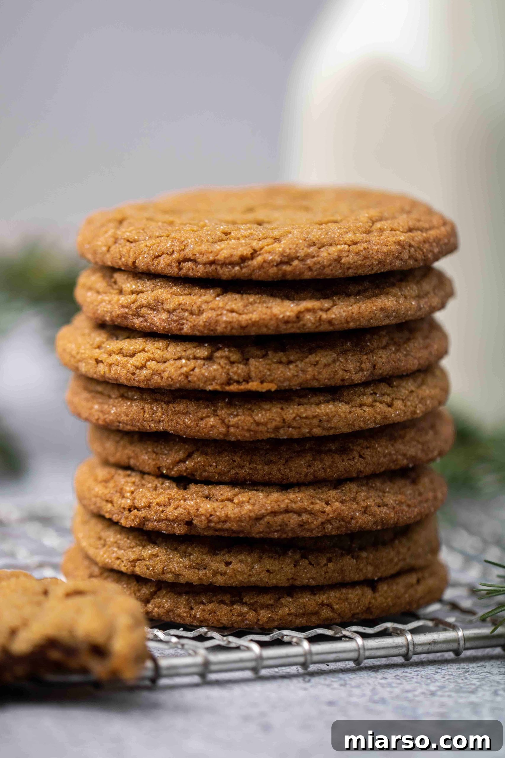 Perfectly Soft and Chewy Ginger Molasses Cookies 2 Stack of soft and chewy ginger molasses cookies, perfectly spiced for the holidays.