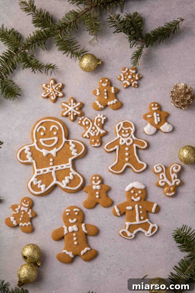 Gingerbread men cookies decorated with various patterns