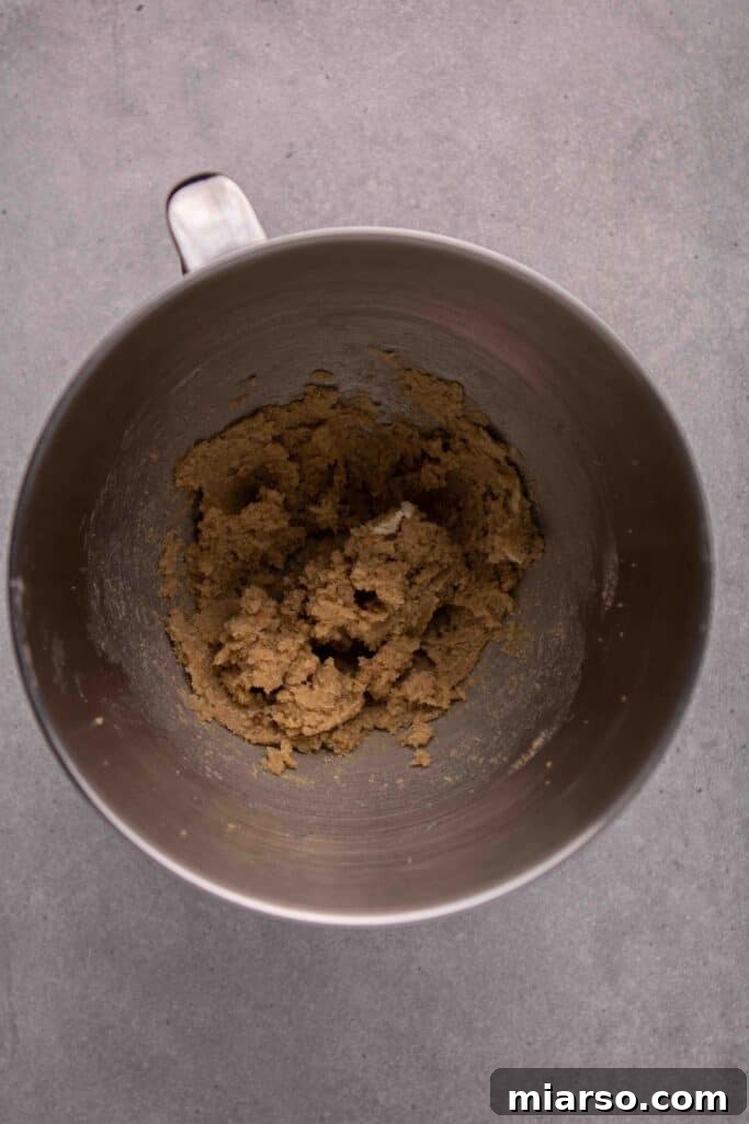 Mixing wet ingredients for no spread gingerbread cookies