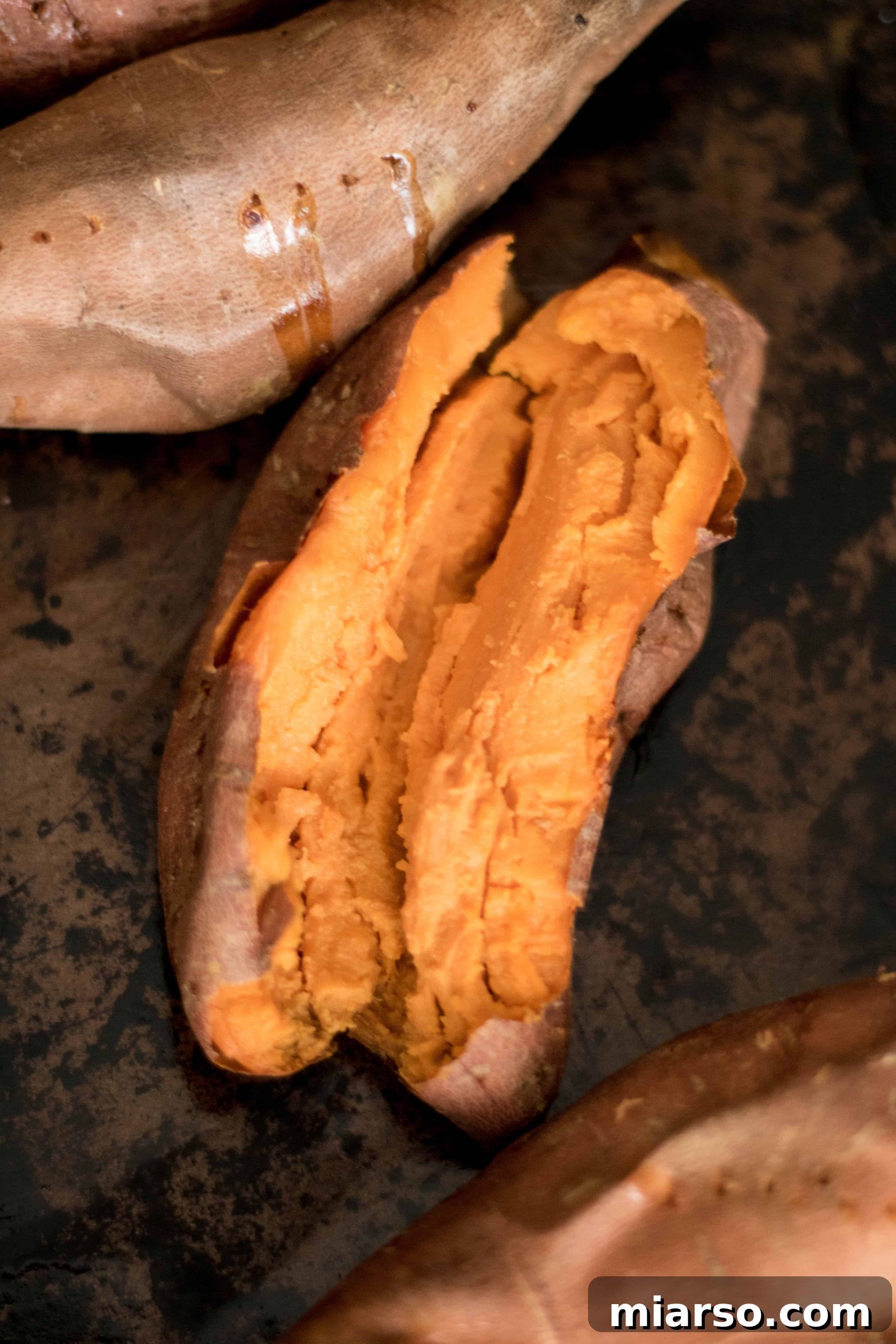 Perfectly baked sweet potatoes in the oven, golden and tender, ready to serve