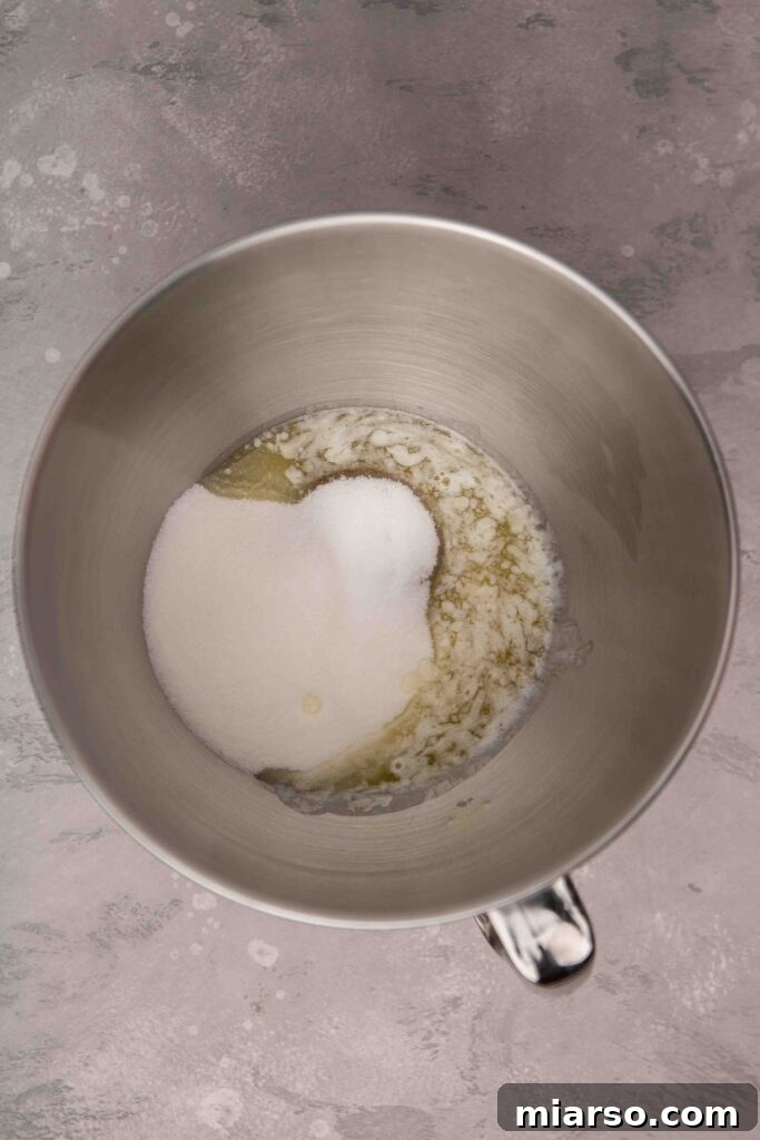 Creamed butter with sugar, showing the lightened color