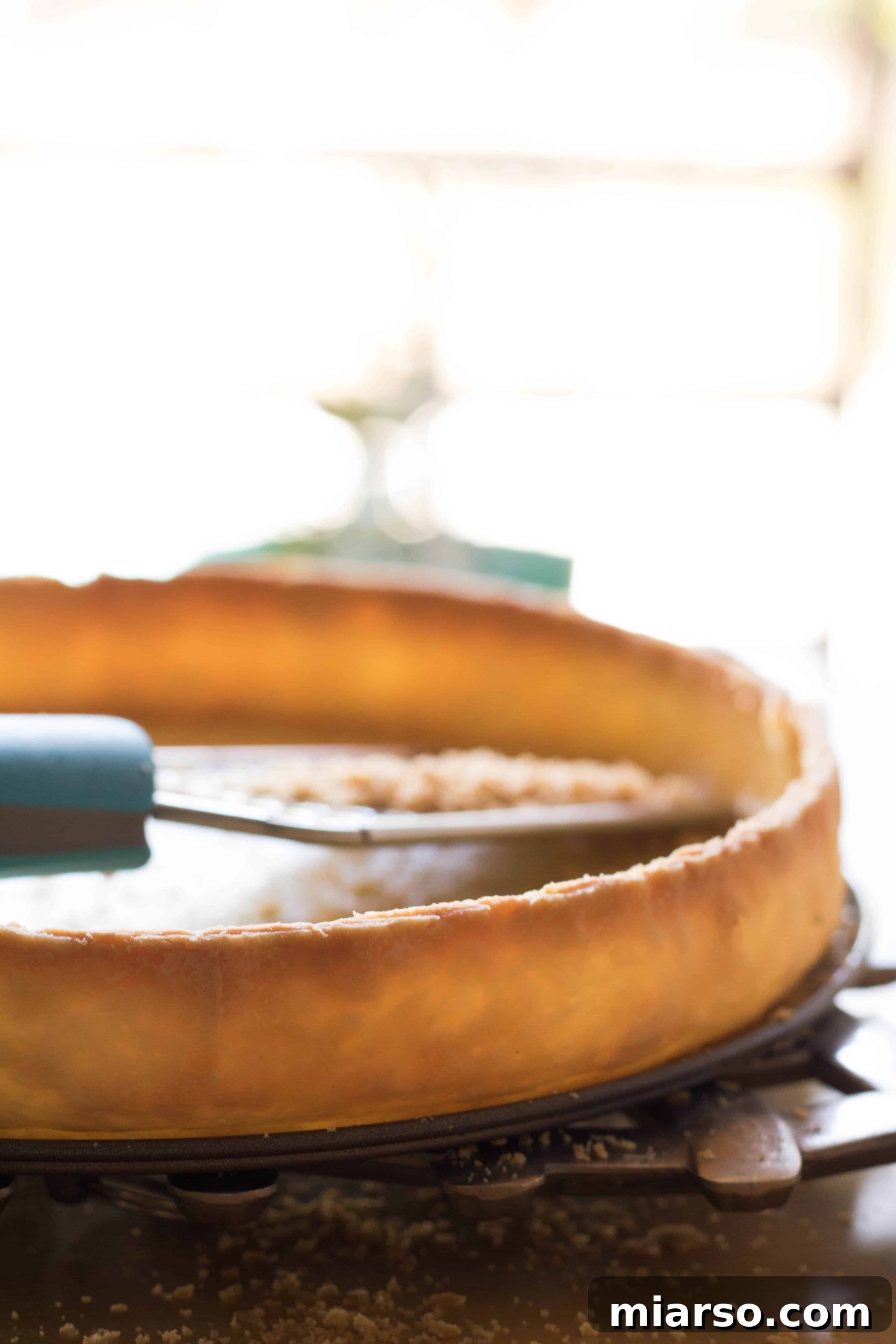 Flaky, golden-brown store-bought sweet potato pie crust prepared for the holidays.
