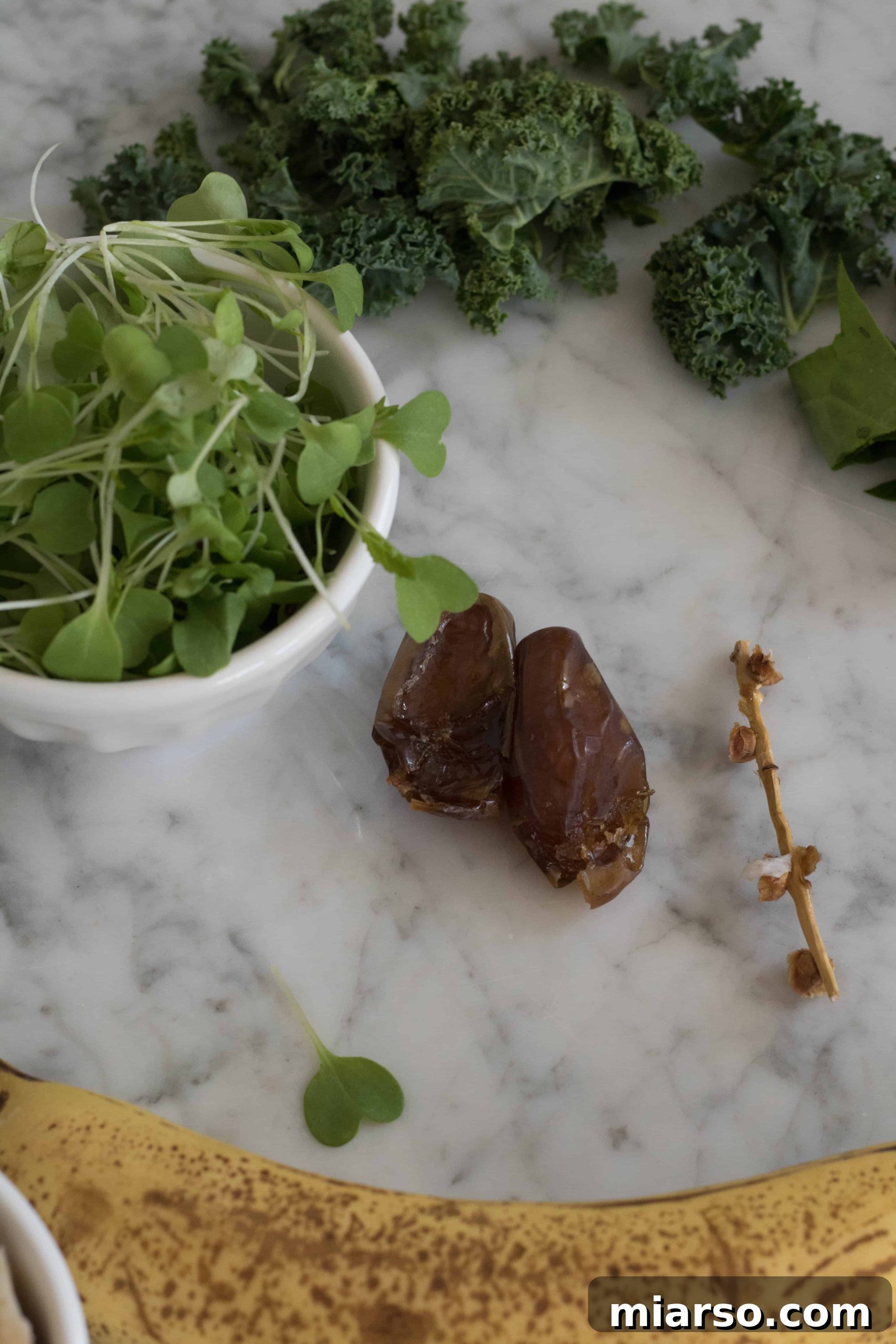 Mizuna Micro-greens as the secret ingredient for a healthy green smoothie, close-up shot