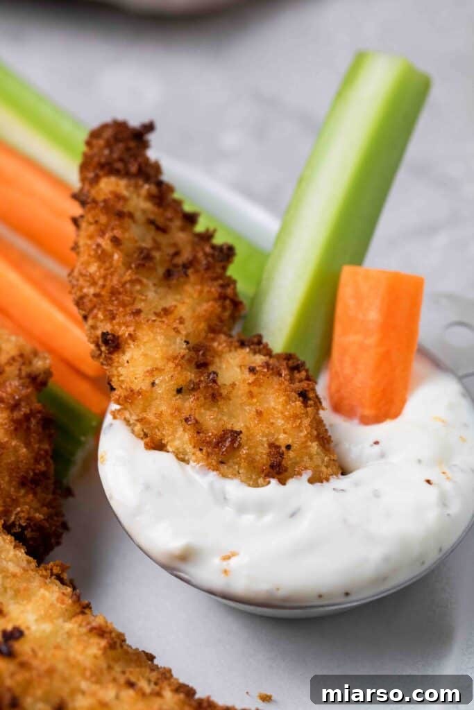 Chicken tender dipped in ranch