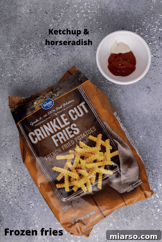 Ingredients for air fryer frozen French fries and spicy ketchup