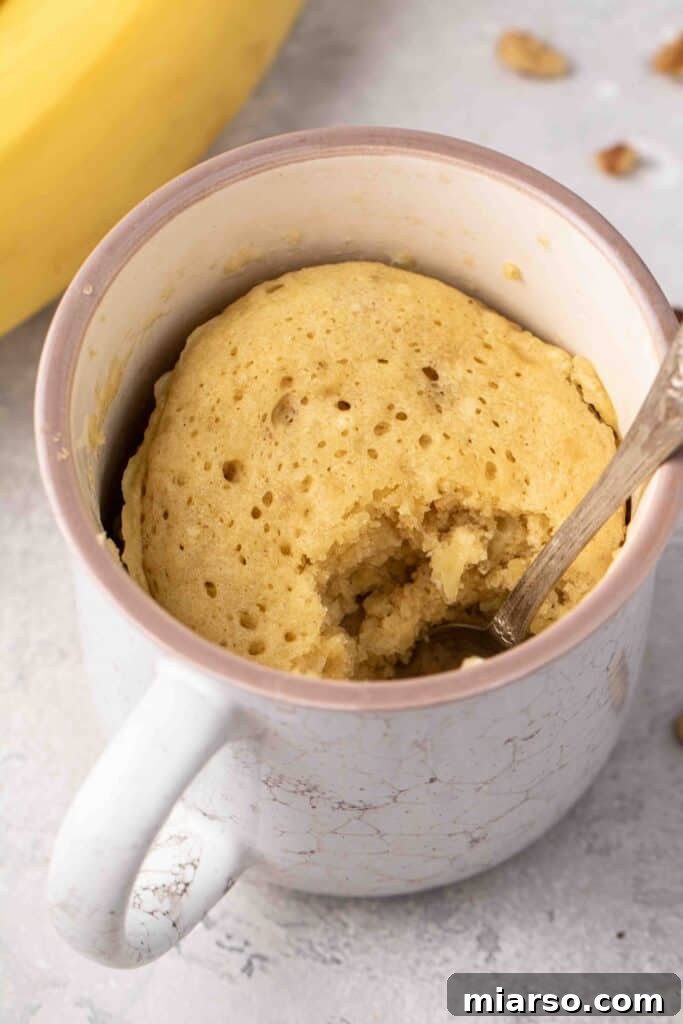 Ultimate Banana Bread Mug Cake Ready in Minutes 3 Close up of banana mug cake
