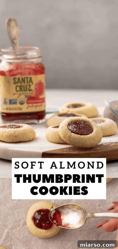Jam-Kissed Almond Thumbprint Cookies 18 A row of delicious almond flour thumbprint cookies with various jam flavors
