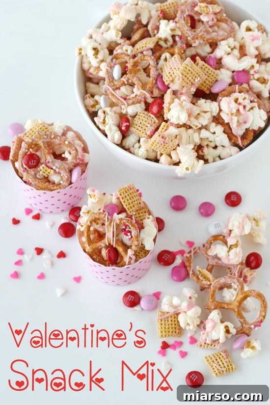 18 Heartfelt No-Bake Valentine Treats Kids Will Adore 14 A festive Valentine's Day snack mix in a bowl, with pink and red treats and various textures.