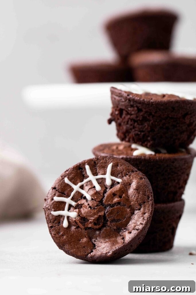 Touchdown Fudgy Brownie Bites 15 A close-up view of multiple fudgy brownie bites, showcasing their rich texture
