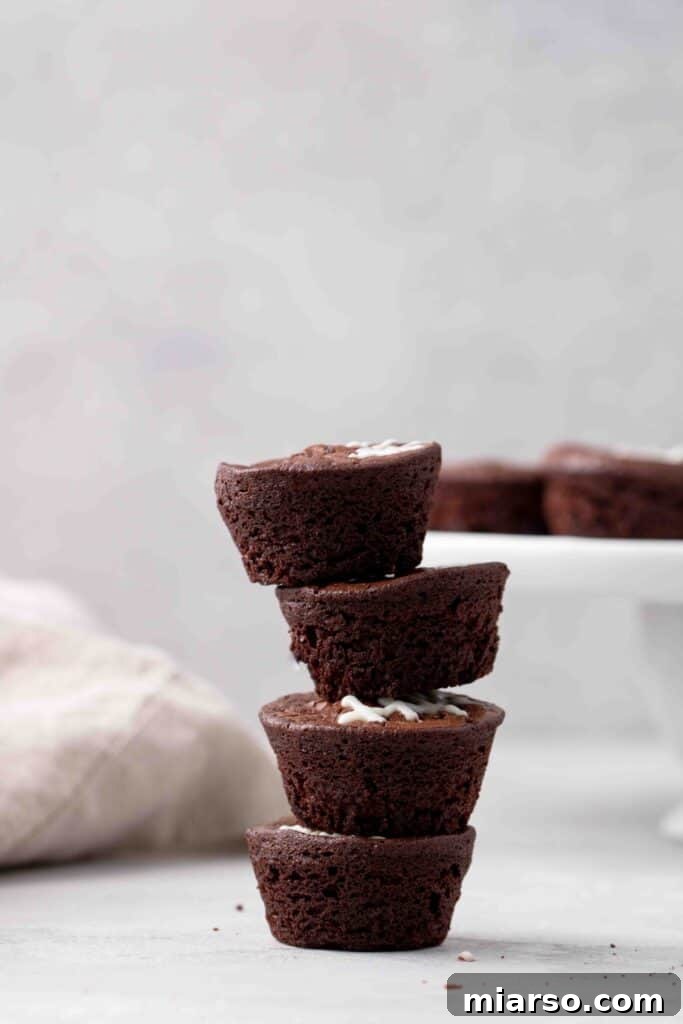 Touchdown Fudgy Brownie Bites 3 A stack of delightful football brownie bites, showcasing their fudgy texture and cute decorations