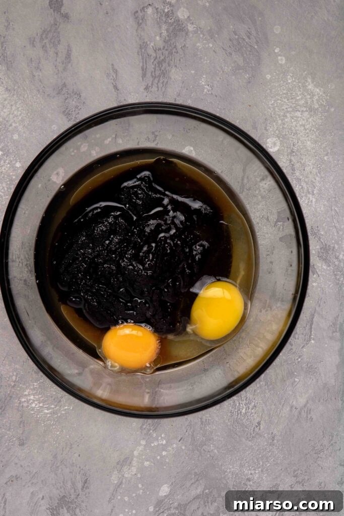 Touchdown Fudgy Brownie Bites 6 Mix in the eggs and oil to the cooled chocolate mixture for fudgy brownies