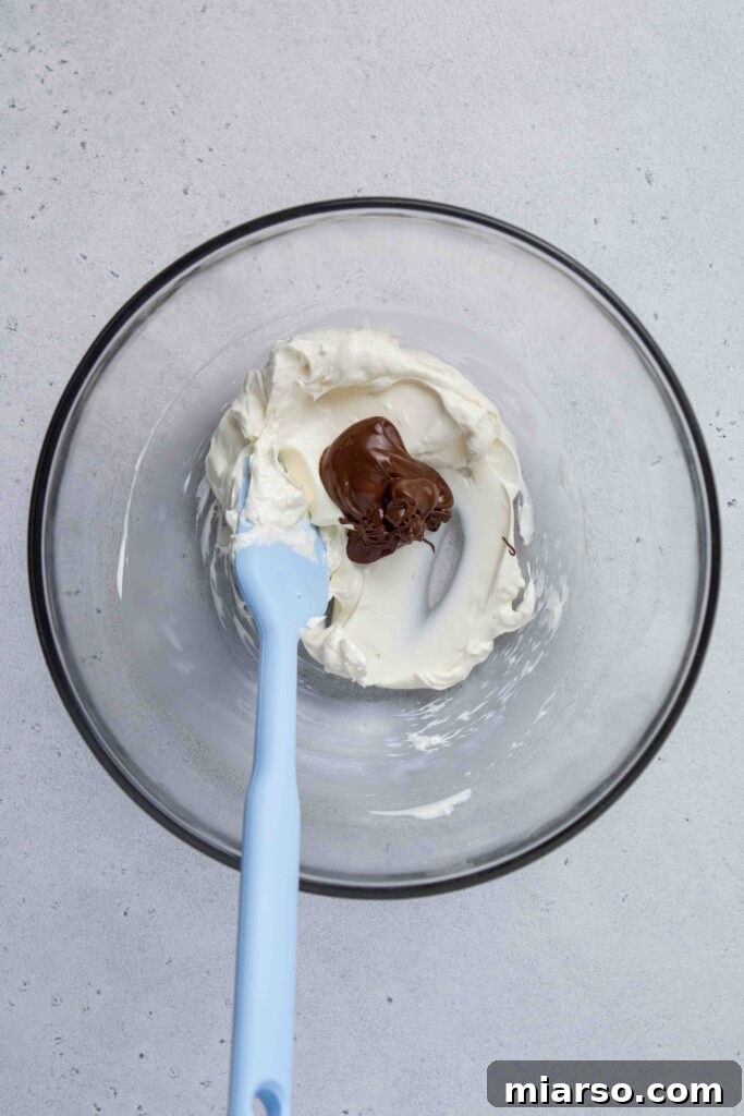 Mini Chocolate Cheesecakes Pure Creamy Indulgence 10 Mix the cream cheese and the chocolate together