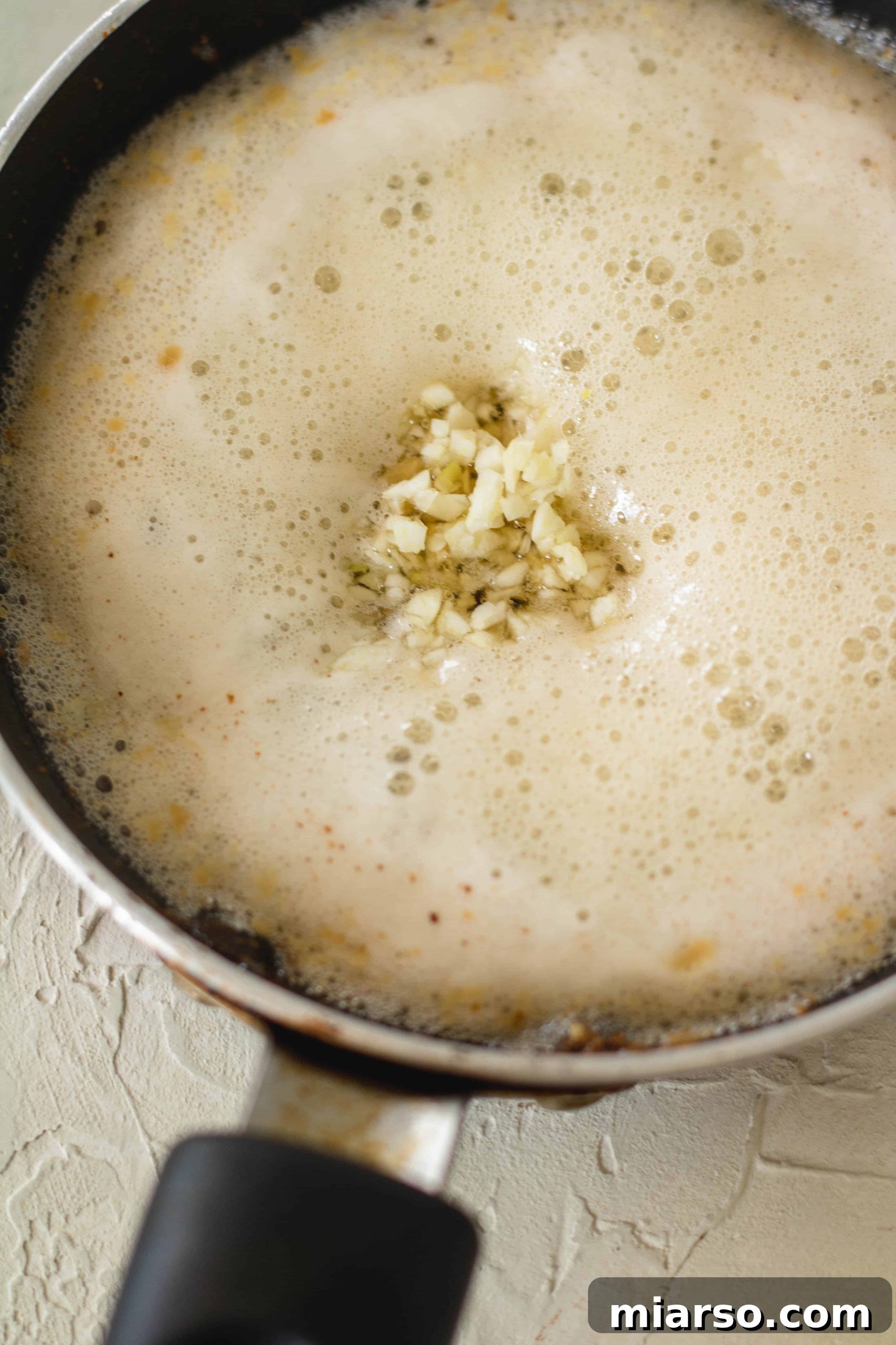 Perfectly browned butter in a saucepan, ready for infusion.