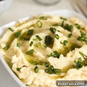 Close-up of creamy brown butter garlic mashed white yams.